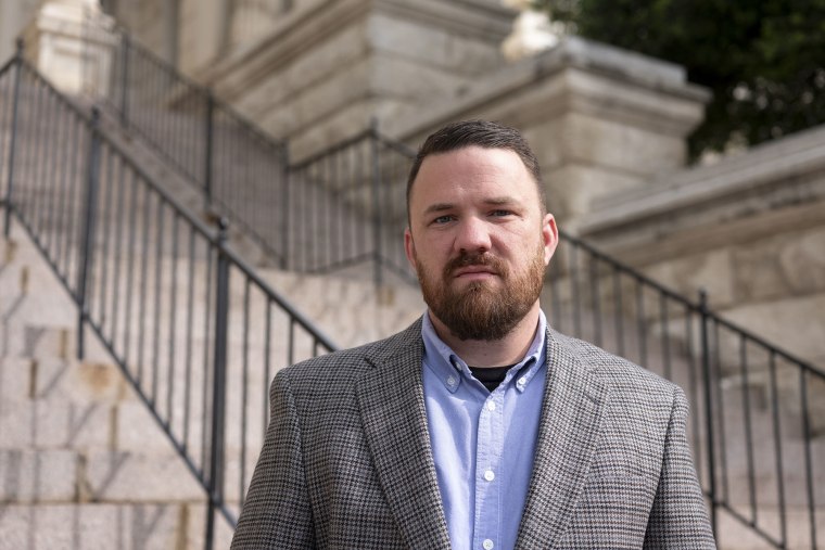 Joseph Cleveland stands outside the courthouse before delivering his victim impact statement.