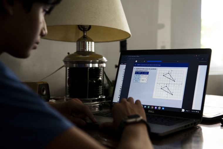 Ward Wooden, 14, demonstrates a math session on i-Ready at his family’s home in Studio City, California. 