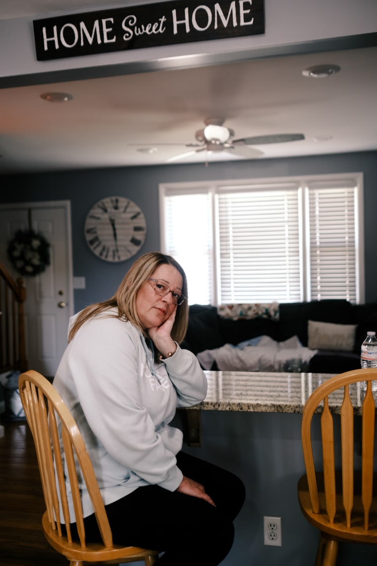 Melissa Gonce seated at her kitchen island