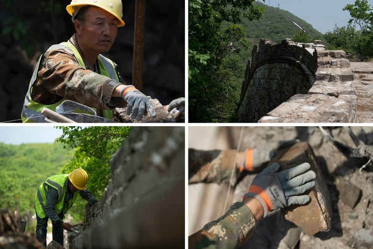 Construction workers at Phase 5 of the Great Wall restoration at Xiangshuihu on Tuesday.
