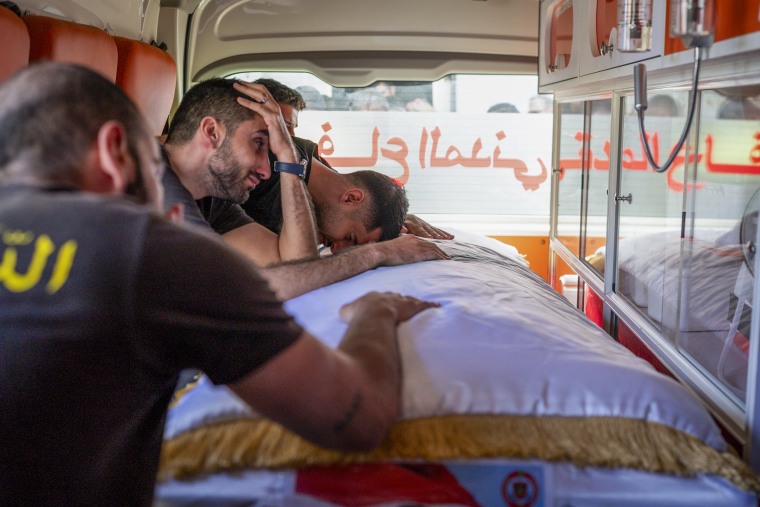 Civil Defense paramedics mourn.