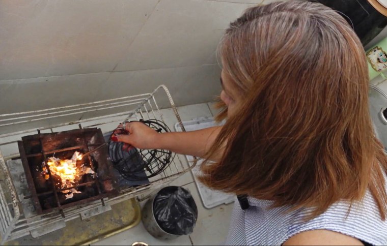 cooking with charcoal in Havana, Cuba
