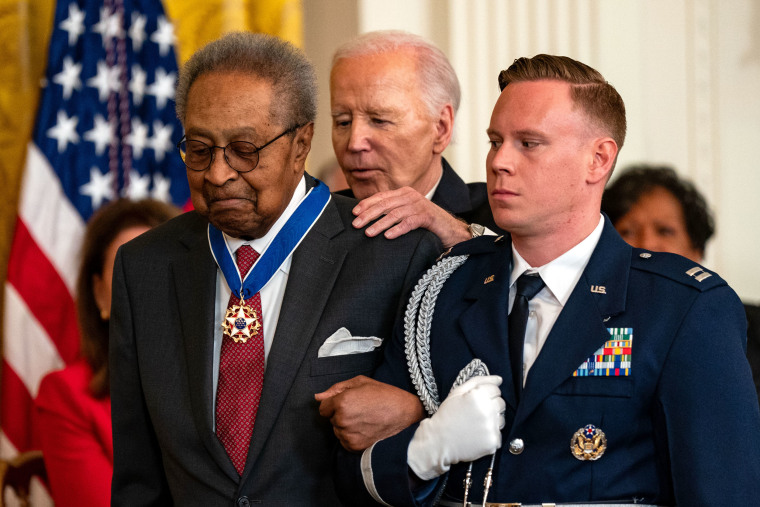 President Joe Biden presents the Presidential Medal of Freedom to civil rights activist and lawyer Clarence B. Jones 