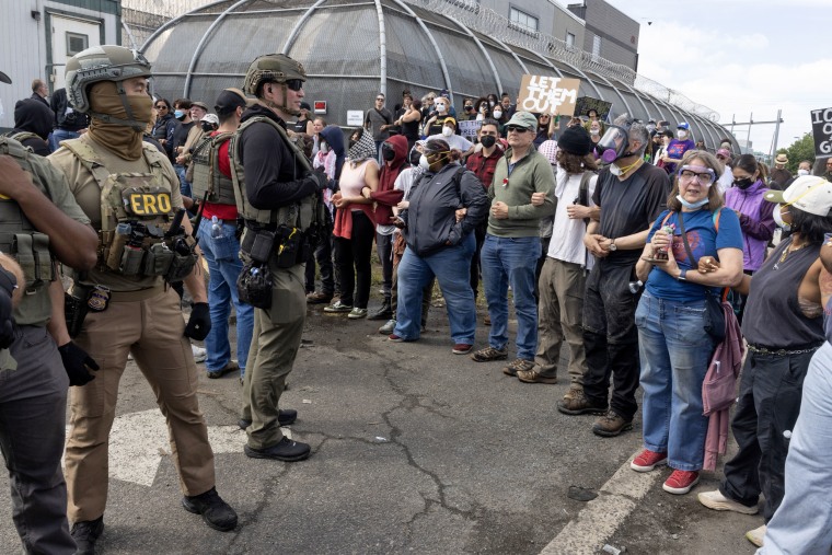 ICE agents and immigration activists clash outside Delaney Hall detention center in Newark, New Jersey
