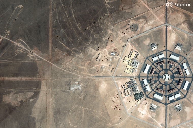 A satellite image shows military activity underway at the edge of the Xinjiang octagon-shaped installation, in the Xinjiang Uyghur Autonomous Region