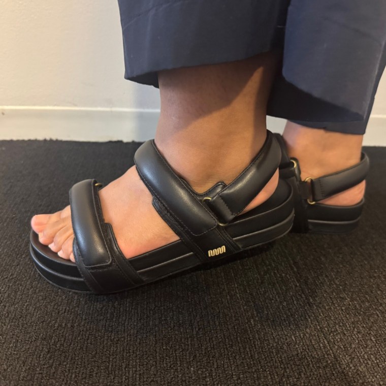 Person wearing Slingback sandals.