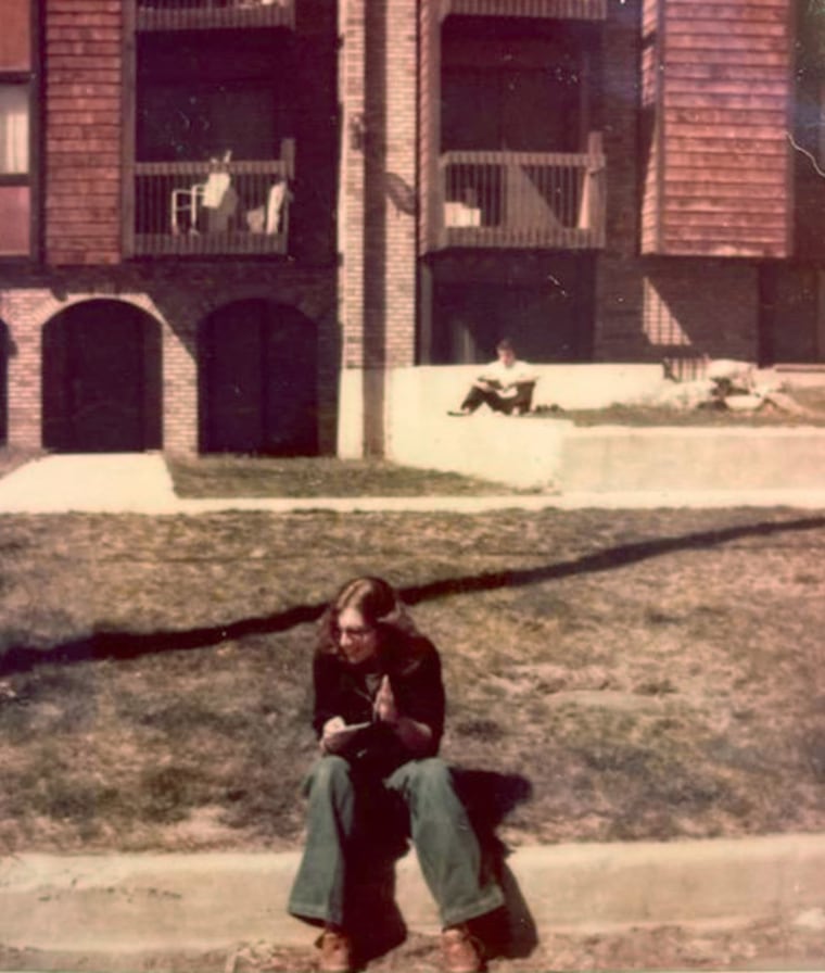 Valaine Briggs sitting outside her apartment in Salt Lake City