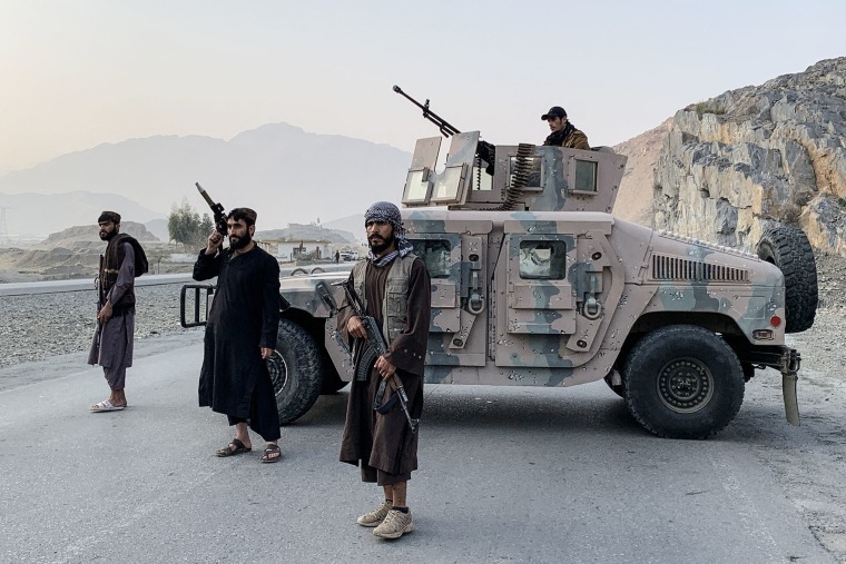 Taliban security personnel stand guard near the Torkham border crossing between Afghanistan and Pakistan on Feb. 27, 2026.