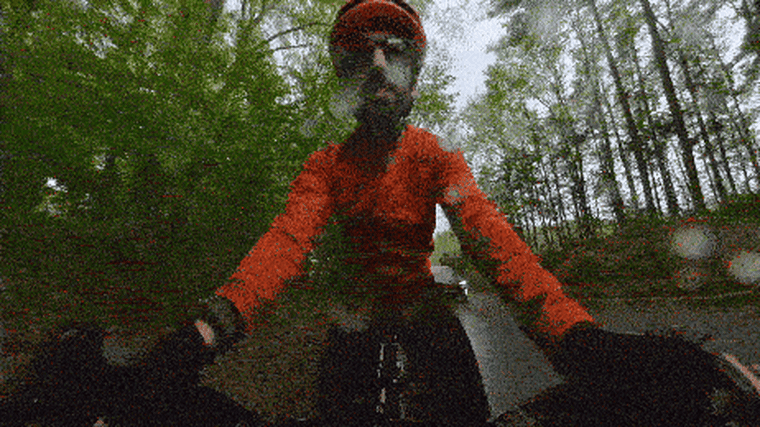 A video of NBC Select reporter Harry Rabinowitz cycling in the rain.
