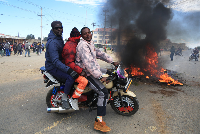 Protesters demonstrate the Ebola treatment center established or Americans in Kenya