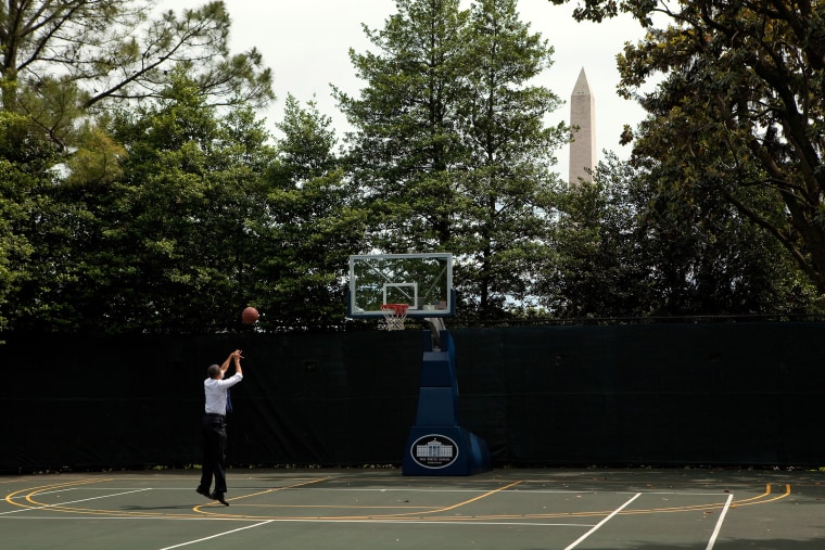 President Barack Obama shoots hoops on the White House Basketball Court during a break between meetings, May 7, 2010.