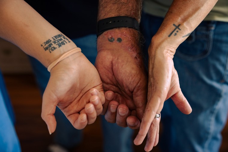 The Levasseurs' tattoos.