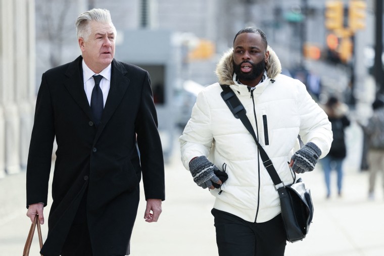 De Niro Luster and his lawyer arrive at his arraignment hearing in Brooklyn Federal Court in New York on December 8, 2025.