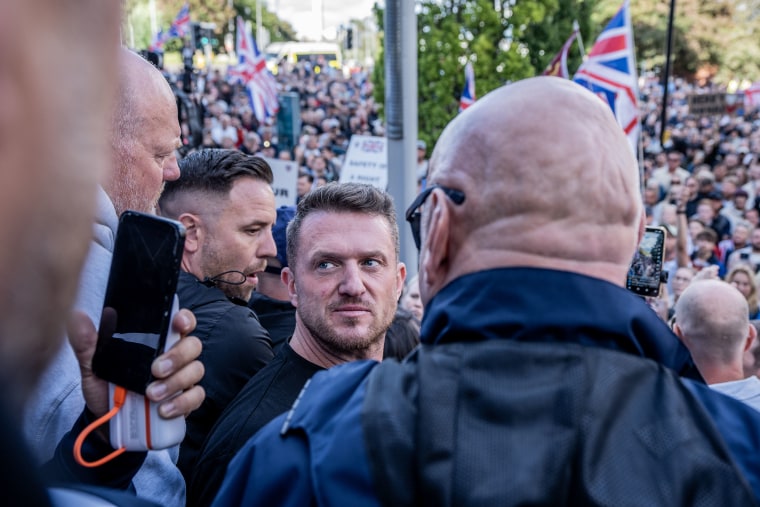 Tommy Robinson speaks at a flash protest outside Southampton