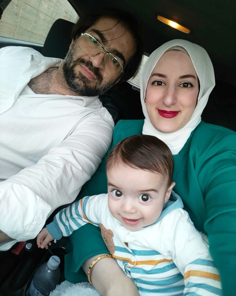 Baby Sam Aby Haikal with father Fahd Abu Haikal, left, and mother Dania Salameh, right.