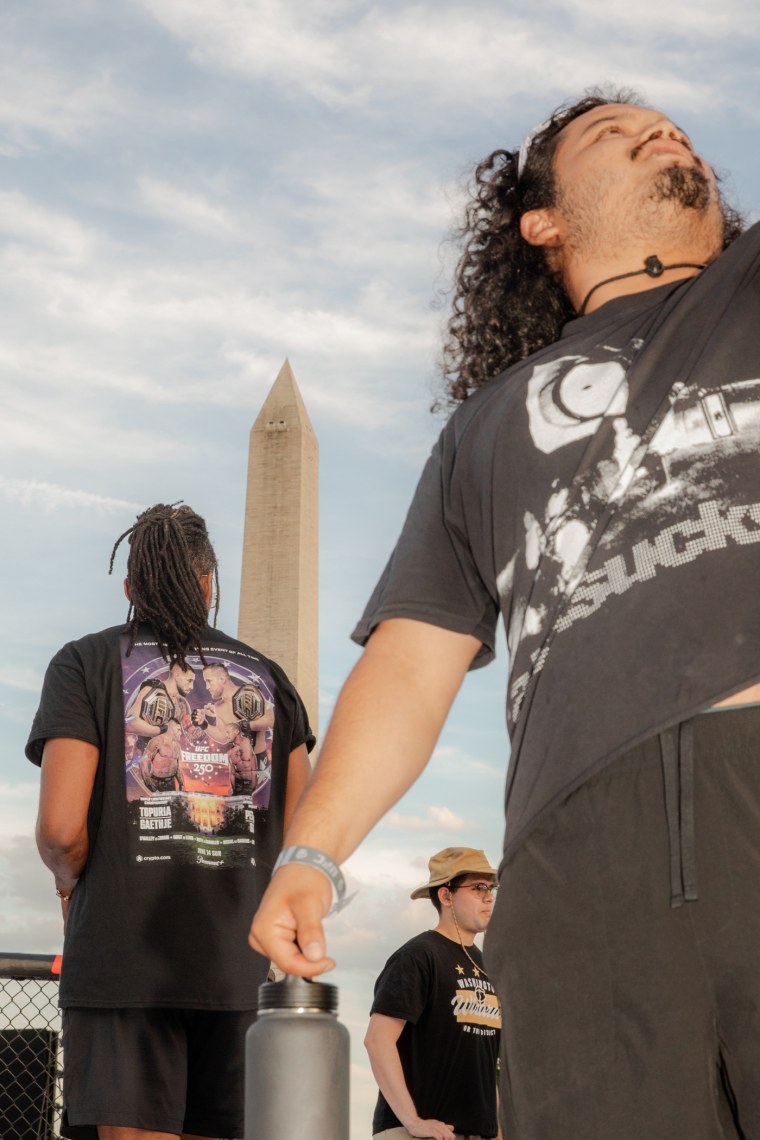 Fans wore official UFC 250 merchandise at the festival, supporting their favorite fighters like Ilia Topuria and Justin Gaethje in the main event.