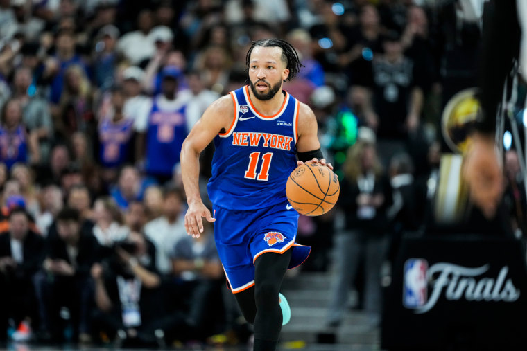 Jalen Brunson runs on the basketball court
