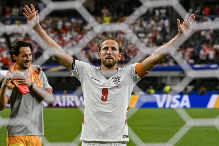 Harry Kane celebrating on the soccer field.