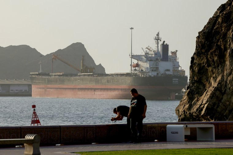 Ships continue to wait in Gulf of Oman for passage through Strait of Hormuz.