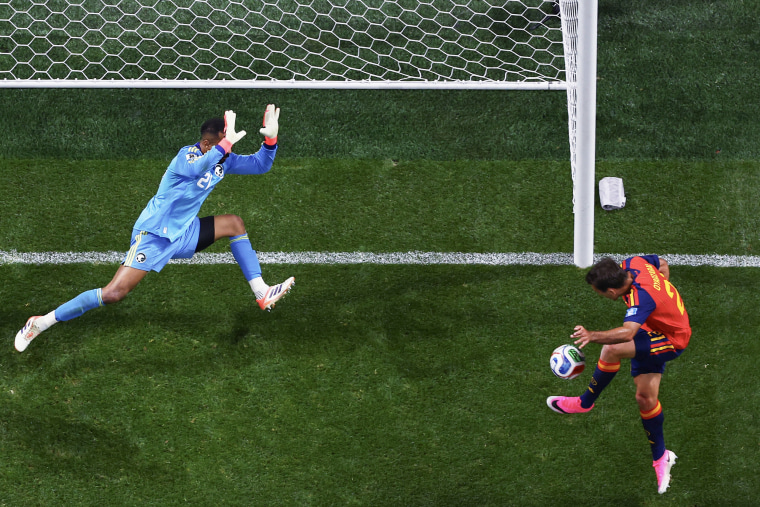 Mikel Oyarzabal shoots toward the goal during a world cup match.