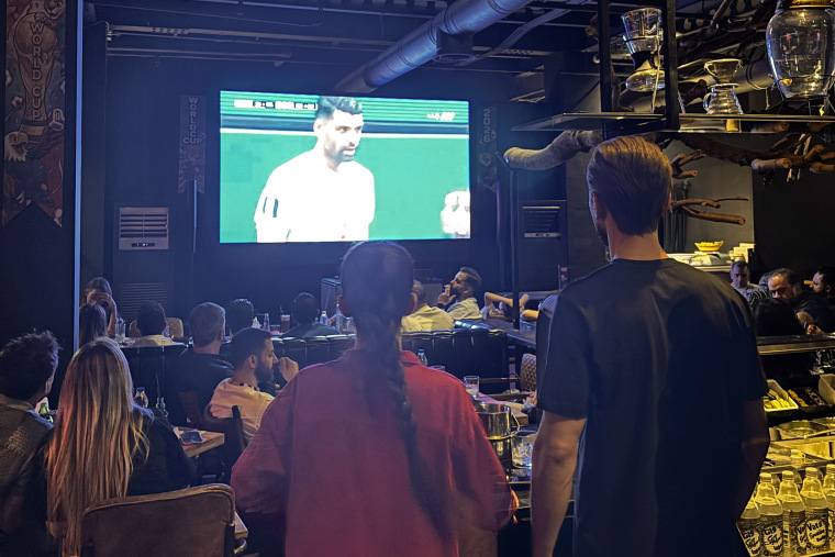 Soccer fans watch the game at Viking Cafe in North Tehran.