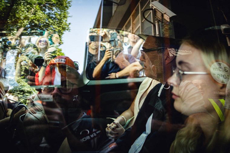 Andy Burnham seen through the window of a London taxi