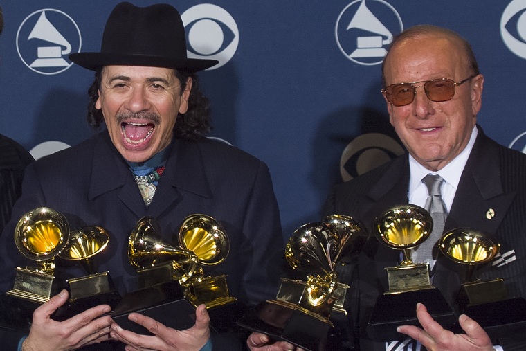 Winner Carlos Santana with Clive Davis at Grammy Awards Show 2000