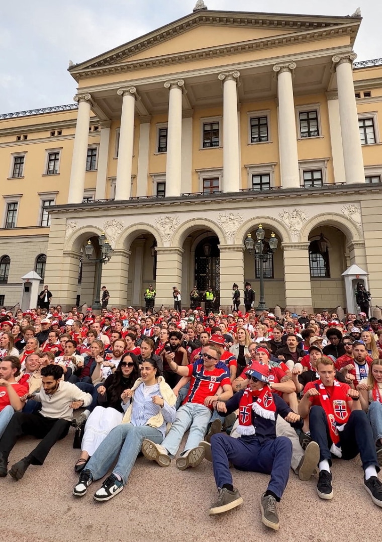 Fans perform 'Viking Row' at Norwegian royal palace after Norway defeats Senegal in FIFA World Cup