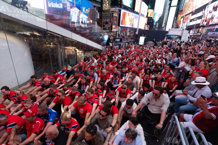 World Cup fans bring vibrant celebrations to Times Square ahead of international matches