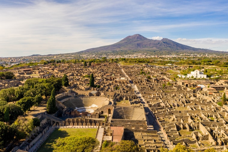 Image: Aerial view of Pompeii with mount Vesuvius in the background