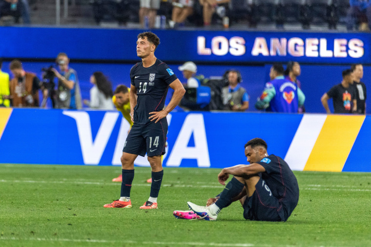 Sebastian Berhalter, left, and Auston Trusty of the U.S. react after their loss in a World Cup match against Turkey on June 25, 2026. 