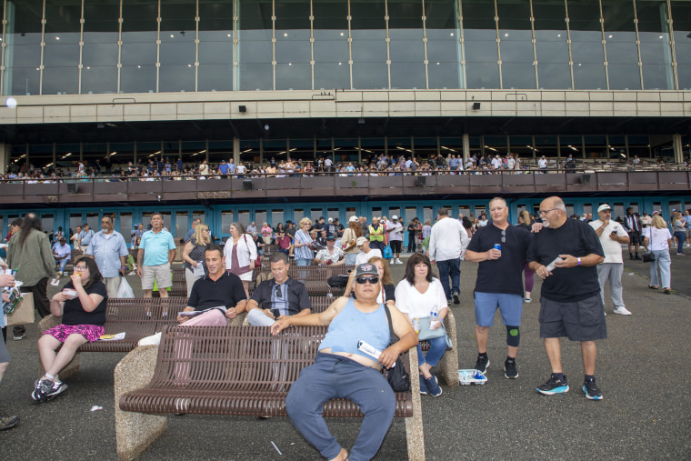 Crowds gather outside to watch the races at Aqueduct Racetrack on June 19.Lili Kobielski