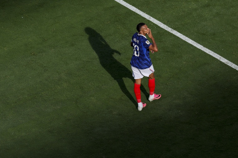 Kylian Mbappe #10 of France celebrates scoring his team's first goal.