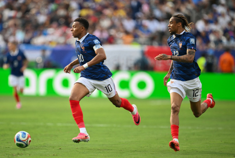 France's forward #10 Kylian Mbappeé controls the ball during  the match between France and Sweden.