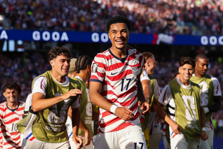 Malik Tillman #17 of the United States celebrates with team mates after scoring his team's second goal during the USA v Bosnia and Herzegovina match.