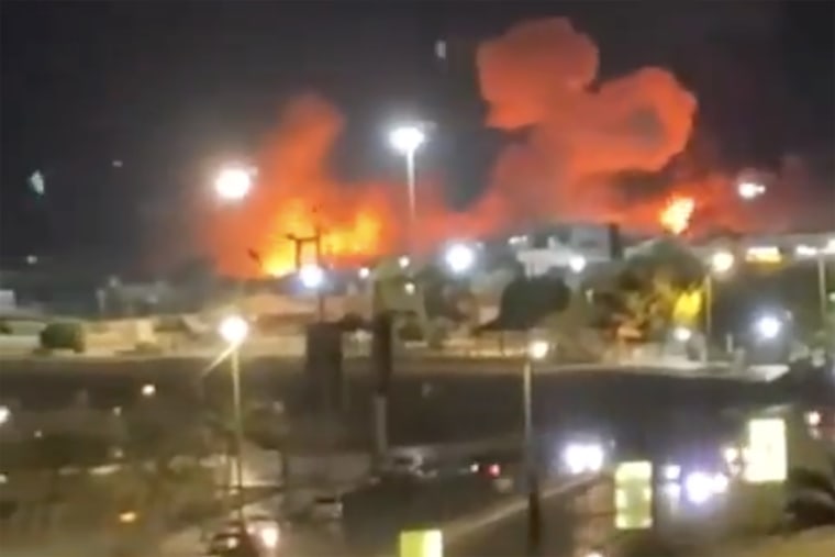 Image: A video screengrab showing explosions and fire near Shahid Haqani Port in Bandar Abbas, Iran