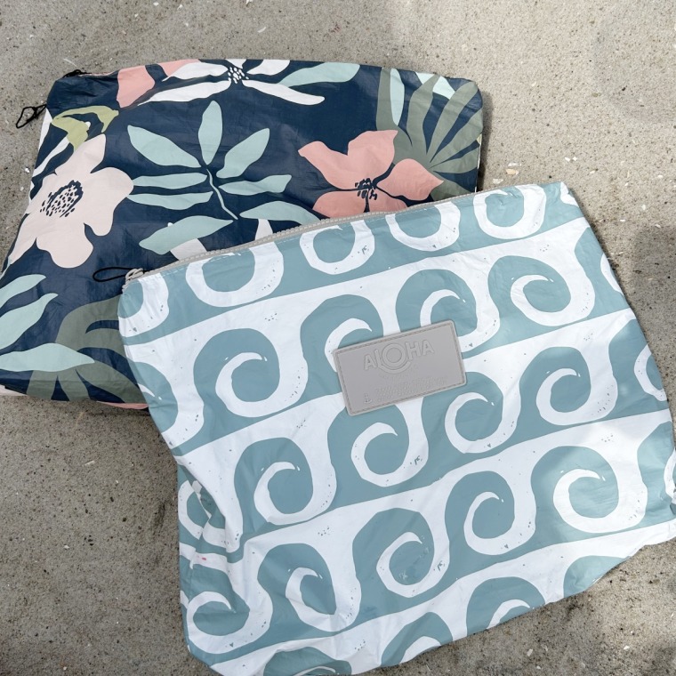 These Aloha pouches saved the day — wet, sandy clothes went straight in, everything else stayed clean.