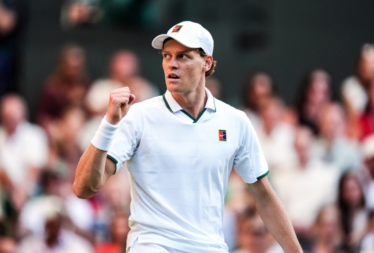 Jannik Sinner puts a fist in the air