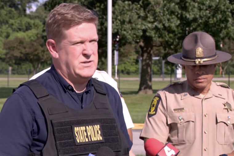 Brendan Kelly, director of the Illinois State Police, center, speaks at a news conference on the shootings in East St. Louis on Sunday.