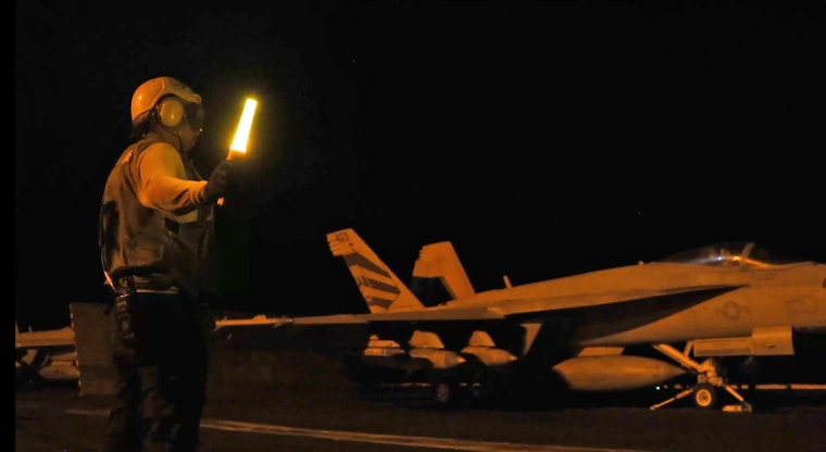 An aircraft prepares to launch as U.S. Central Command forces strike Iranian military targets in footage released on July 12, 2026. 