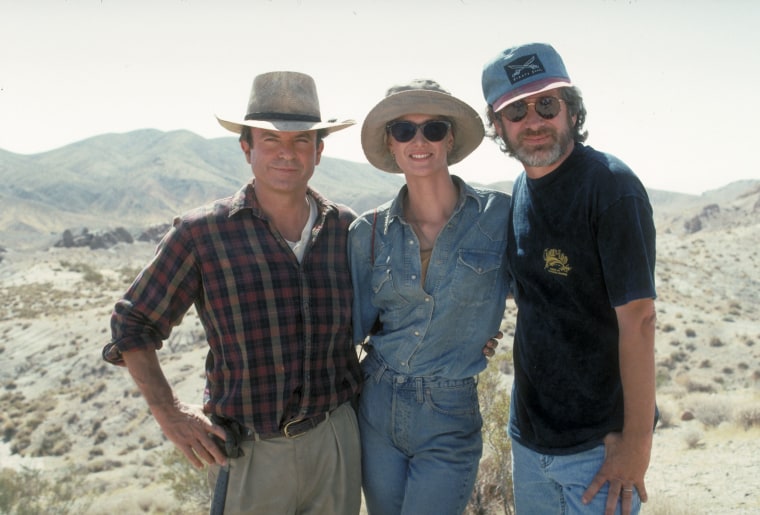 Sam Neill, Laura Dern and Steven Spielberg in a publicity still for "Jurassic Park."