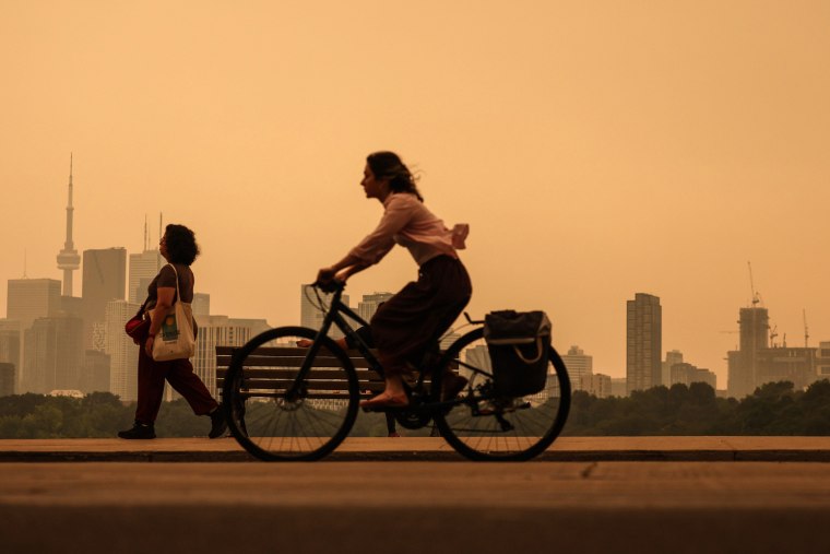 Smoke from Northern Ontario forest fires has the City of Toronto skyline is shrouded in haze