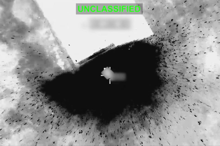 The aftermath of a U.S. strike on a target inside Iran, in footage released by Centcom, Friday. 