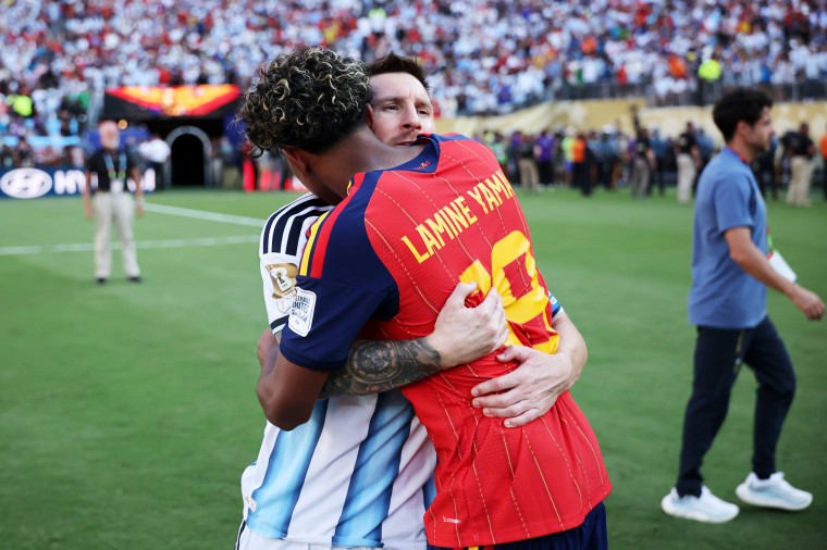 Lamine Yamal #19 of Spain is congratulated by Lionel Messi of Argentina after the 1-0 win in the World Cup final on July 19, 2026.