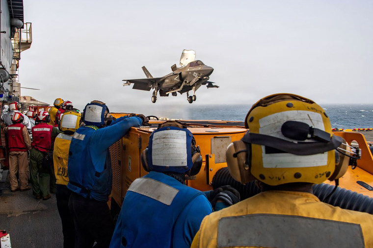 U.S. service members support flight operations from the Arabian Sea, in an official photo shared on July 20.