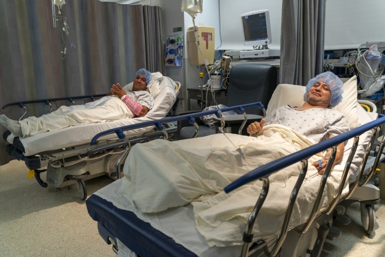 Jose Alfredo Pacheco Gonzalez, left, and Jose Gregorio Gonzalez prepare for a living kidney transplant on Aug. 14, 2025, at University of Illinois Hospital.