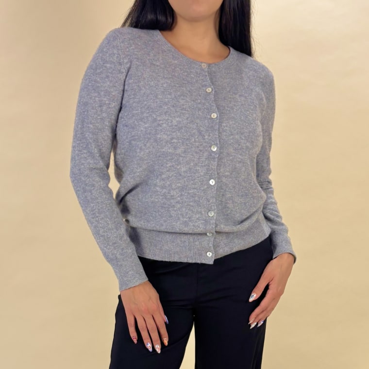 Jannely Espinal wears a cashmere cardigan.