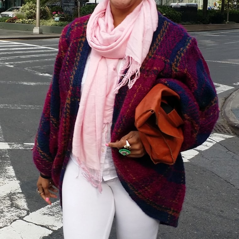 Sandra Okerulu showcases an example of an oversized cardigan style.