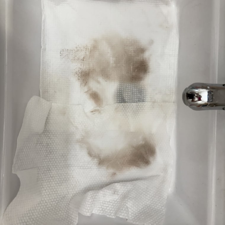 A Grace & Stella disposable towel (top) compared to an Ourmed disposable towel (bottom) after cleaning my face.