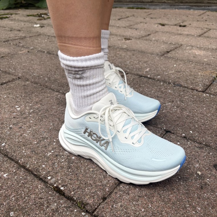 Writer Emma Stessman shows off her new Hoka Clifton 11s.